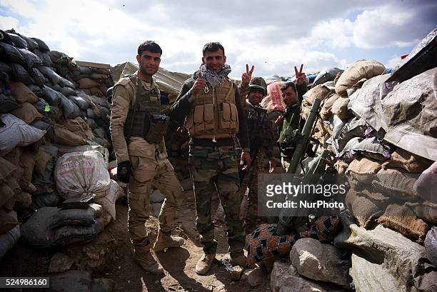 Members of the Kurdish Peshmerga forces, PKK and YPG fighting for retaking the Sinjar City from ISIS, on March 23, 2015.