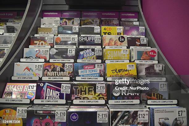 Physical records, in the format of compact disc or vinyl, competing with digital download and music streaming services on sale in a branch of the...