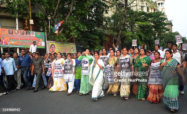 West Bengal Chief Minister Mamata Banerjee participated in a protest rally against the central government's land bill policy in Kolkata , India on...