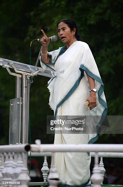 West Bengal Chief Minister Mamata Banerjee deliver her speech in a protest rally against the central government's land bill policy in Kolkata , India...