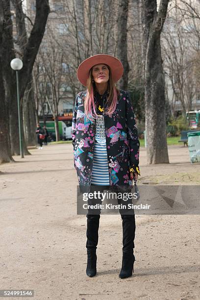 Fashion Editor at large for Vogue Japan Anna Dello Russo wears a Giambattista Valli jacket, Nick Fouquet hat on day 7 during Paris Fashion Week...