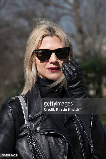 Fashion Blogger Samantha Angelo wears RayBan sunglasses, Schott jacket on day 7 during Paris Fashion Week Autumn/Winter 2016/17 on March 7, 2016 in...
