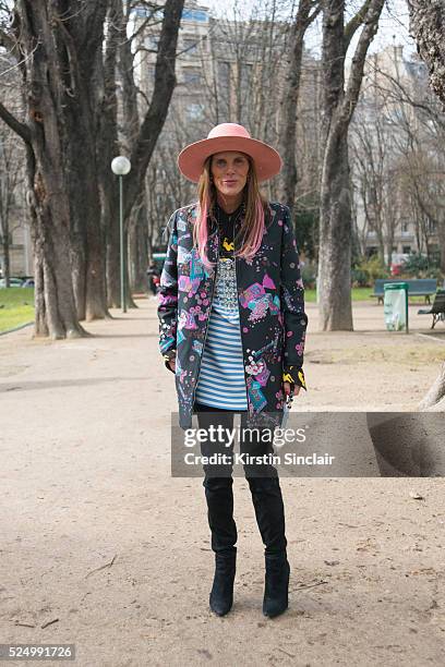 Fashion Editor at large for Vogue Japan Anna Dello Russo wears a Giambattista Valli jacket, Nick Fouquet hat on day 7 during Paris Fashion Week...