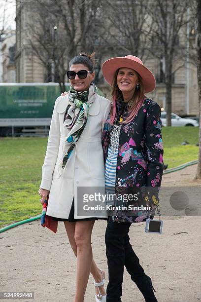 Editor of L"u2019Uomo Vogue Giovanna Battaglia wearing Chanel sunglasses with Fashion Editor at large for Vogue Japan Anna Dello Russo wearing a...