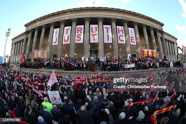 Thousands of people gather outside Liverpool's Saint George's Hall as they attend a vigil for the 96 victims of the Hillsborough tragedy on April 27,...