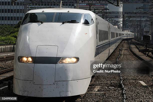 Tokai's Tokaido Shinkansen bullet trains stand at platforms at Tokyo station in Tokyo, Japan, 18 May 2015.