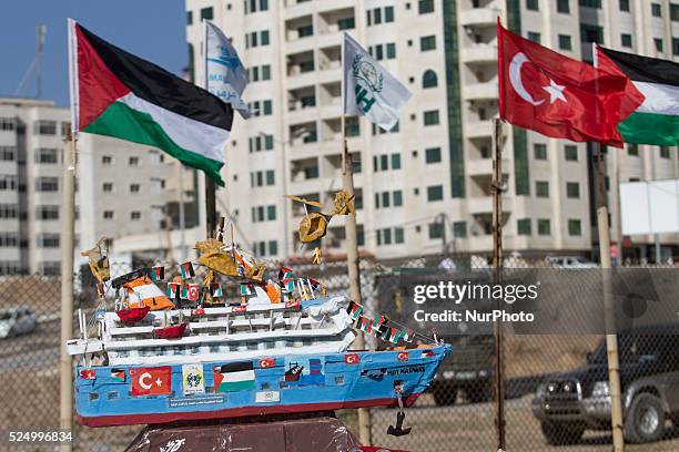 Palestinian kids watching miniature of Mavi Marmara ship, Dozens of Palestinian gathering at Gaza city port to commemorates the fifth anniversary of...