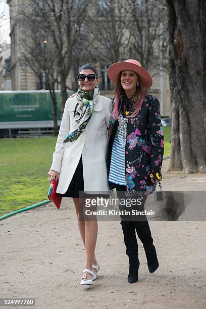 Editor of L"u2019Uomo Vogue Giovanna Battaglia wearing Prada shoes, Chanel sunglasses and a Sara Battaglia bag with Fashion Editor at large for Vogue...