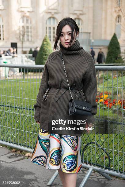 Fashion Blogger Wangan wearing a Haider Hackerman sweater, Chanel bag and Vika Gazinskaya skirt on day 7 during Paris Fashion Week Autumn/Winter...