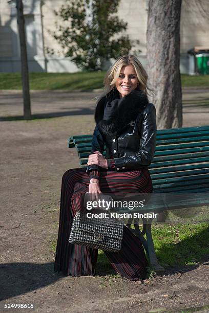 Fashion Blogger Lala Rudge wears Courreges jacket, Balmain trousers and Chanel bag on day 7 during Paris Fashion Week Autumn/Winter 2016/17 on March...