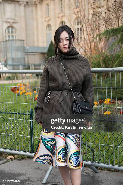 Fashion Blogger Wangan wearing a Haider Hackerman sweater, Chanel bag and Vika Gazinskaya skirt on day 7 during Paris Fashion Week Autumn/Winter...