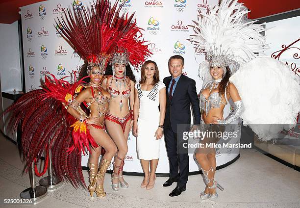 Jessica Ennis-Hill and Vice-President of OMEGA Mr Raynald Aeschilmann pose with Brazilian dancers at a VIP Dinner to highlight OMEGAs association...