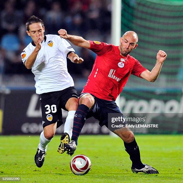 Lille's Robert Vittek and Valencia's Michel during the UEFA Europa League soccer match, LOSC Lille Metropole vs Valencia CF at the Stadium Nord in...