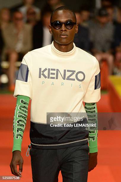Model presents a creation from the Spring/Summer 2012/2013 Men's collection of Kenzo at the Paris Fashion Week, in Paris, France, 30 June 2012. The...