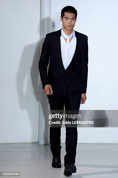 Model presents a creation from the Spring/Summer 2012/2013 Men's collection of Mugler at the Paris Fashion Week, in Paris, France, 27 June 2012. The...