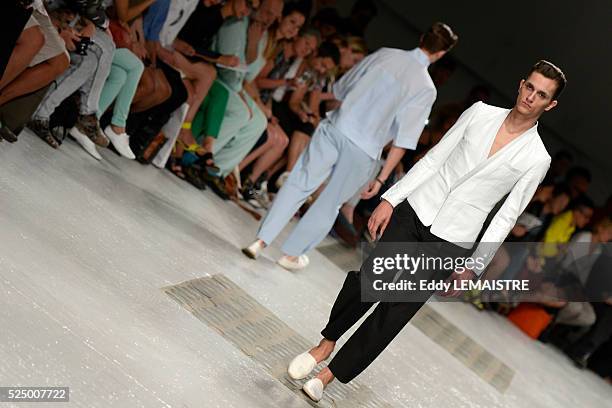 Model presents a creation from the Spring/Summer 2012/2013 Men's collection of Songzio at the Paris Fashion Week, in Paris, France, 01 July 2012. The...