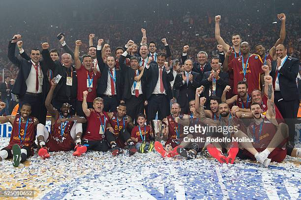 Players of Galatasaray Odeabank Istanbul, new Champion, pose with trophy at the end of the EuroCup Basketball Finals Game 2 between Galatasaray...