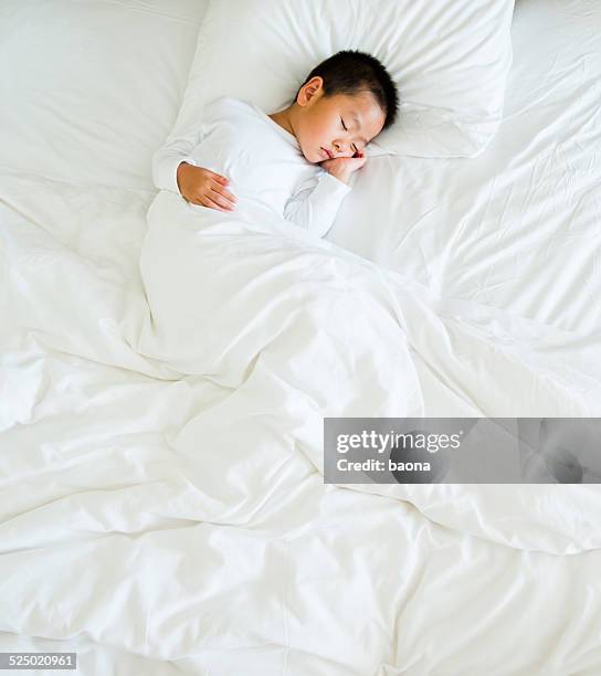 sleeping boy - toddler sleeping stock pictures, royalty-free photos & images