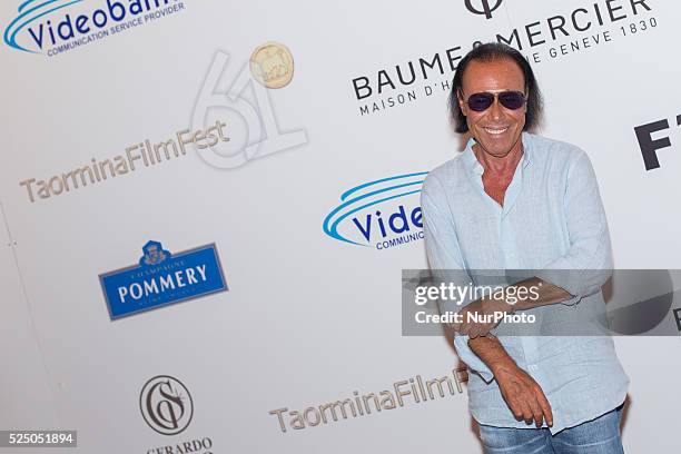 Italian singer-songwriter Antonello Venditti poses for photographers during the 61th Taormina Film Festival, in Taormina, Sicily Island, Italy, 17...
