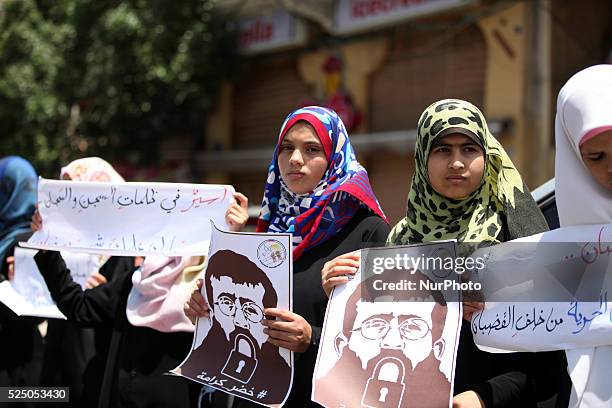 Relatives of palestinian prisoners stage a rally in Gaza on June 28, 2015. A human chain in solidarity with prisoner Khader Adnan on hunger strike...