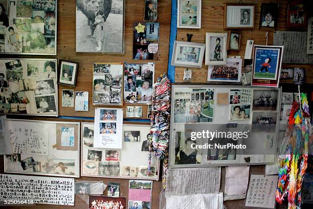 Relatives of the victims of the 1985 Japan Airlines jumbo jet crash pray in front of the victims' monument at Osutaka Ridge north of Tokyo, Japan,...