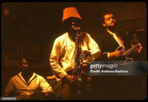 American Jazz musician Henry Threadgill plays saxophone as he performs onstage with his sextet, New York, New York, 1980s.