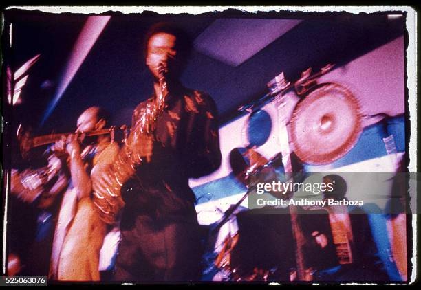 American Jazz musician Henry Threadgill plays saxophone as he performs, with his sextet, onstage at SOB's, New York, New York, 1980s.