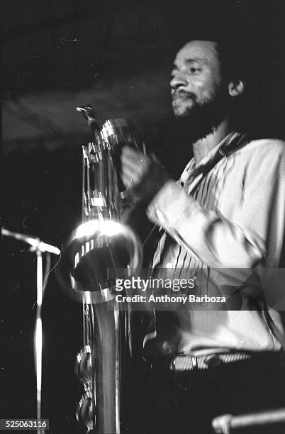 American Jazz musician Henry Threadgill plays saxophone as he performs onstage with his trio, Air, New York, New York, 1980s.
