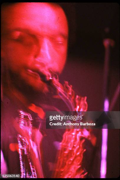American Jazz musician Henry Threadgill plays saxophone as he performs onstage, New York, New York, 1980s.