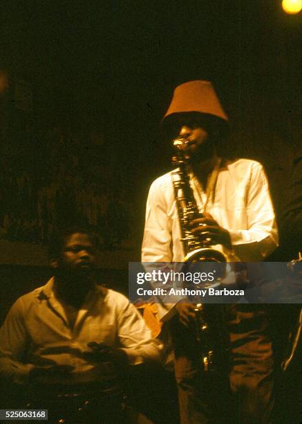 American Jazz musician Henry Threadgill plays saxophone as he performs onstage with his sextet, New York, New York, 1980s.