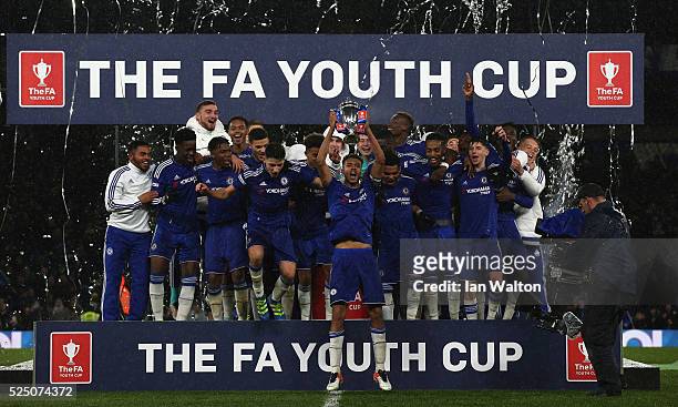 Chelsea team celebrates with the trophy after winning the FA Youth Cup Final - Second Leg match between Chelsea v Manchester City at Stamford Bridge...