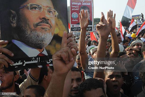 Supporters of the ousted President Mohammed Morsi gather in Nasser City, suburb of Cairo, Egypt, Monday, July 8, 2013 Photo: Nameer Galal/NurPhoto