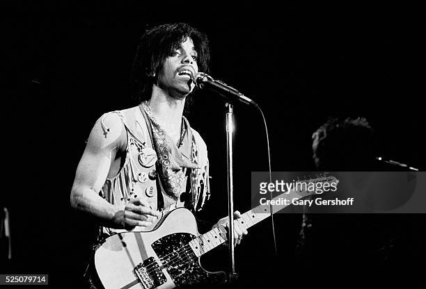 American musician Prince plays guitar as he performs onstage at the Ritz during his 'Dirty Mind' tour, New York, New York, March 22, 1981.