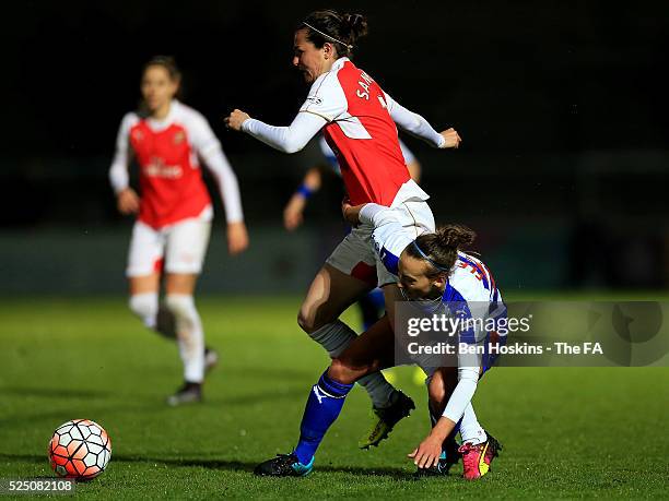 Natalia Pablos Sanchon of Arsenal is tackled by Helen Ward of Reading during the WSL 1 match between Reading FC Women and Arsenal Ladies FC on April...
