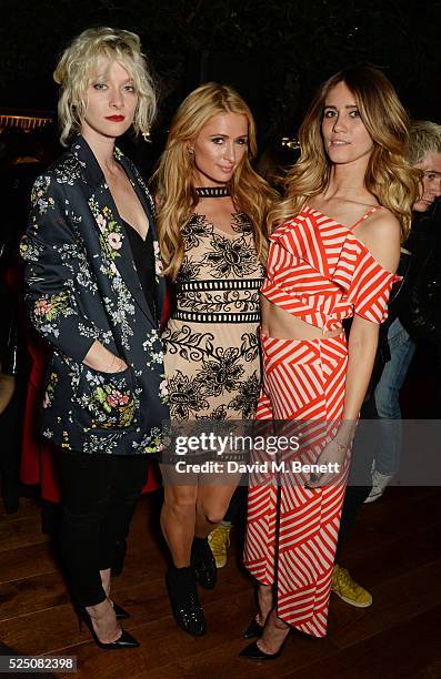 Portia Freeman, Paris Hilton and Jade Williams attend the launch of Restaurant Ours in Kensington on April 27, 2016 in London, England.