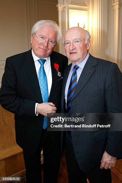 Alain Duault and Daniel Bouton attend as Alain Duault is honored with the Insignia of Officer of the Legion of Honor at Salle Gaveau on April 13,...