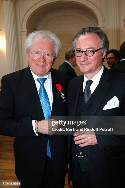 Alain Duault and Pianist Francois Weiger attend as Alain Duault is honored with the Insignia of Officer of the Legion of Honor at Salle Gaveau on...