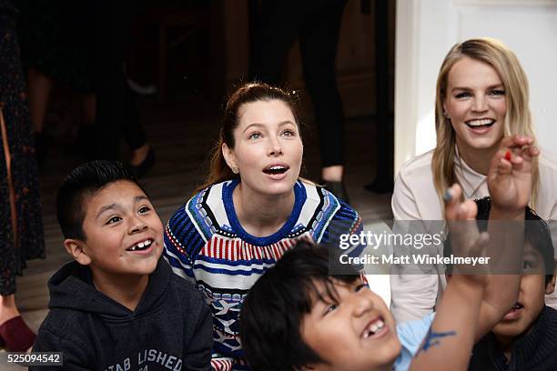 Actress Jessica Biel and model/co-president of Baby2Baby Kelly Sawyer Patricof interact with guests during the Baby2Baby Mother's Day Party presented...