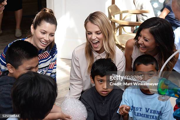 Actress Jessica Biel, model/co-president of Baby2Baby Kelly Sawyer Patricof, and co-president of Baby2Baby Norah Weinstein interact with guests...