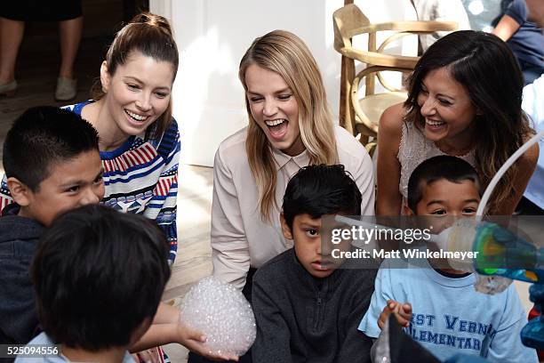 Actress Jessica Biel, model/co-president of Baby2Baby Kelly Sawyer Patricof, and co-president of Baby2Baby Norah Weinstein interact with guests...