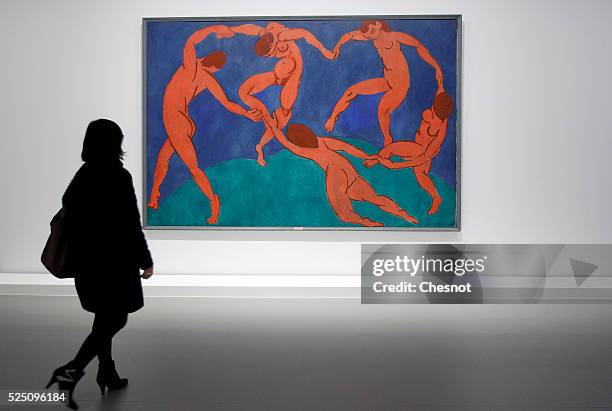 Visitor looks at a painting The Dance of Henri Matisse as part of the opening of the exhibition "Keys to a Passion" at the Louis Vuitton Foundation...