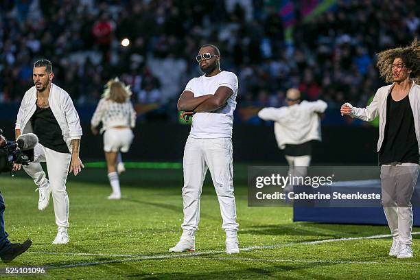 Maitre Gims performs before the Coupe de la Ligue Final game between Paris Saint-Germain and Losc at Stade de France on April 23, 2016 in Paris,...