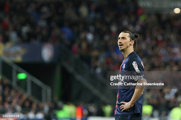 Zlatan Ibrahimovic of Paris Saint-Germain reacts to a play during the Coupe de la Ligue Final game between Paris Saint-Germain and Losc at Stade de...