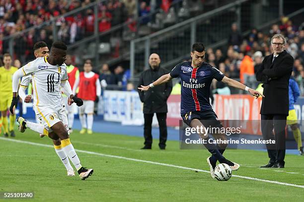 Javier Pastore of Paris Saint-Germain controls the ball against Ibrahim Amadou of Losc during the Coupe de la Ligue Final game between Paris...