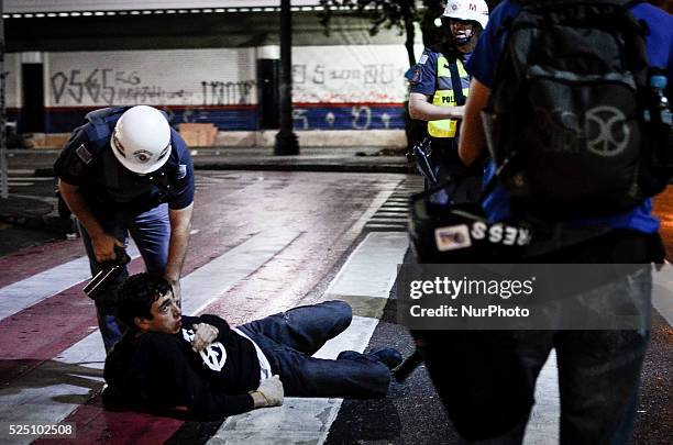 Protester is arrested byt the police during demonstration this friday against the raise in public transport fares, from R$ 3 to R$ 3 in Sao Paulo,...