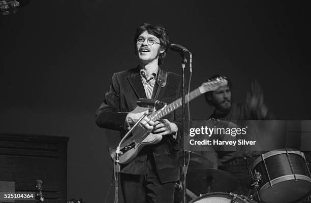 Guitarist Robbie Robertson and drummer Levon Helm of The Band perform during a concert at Queens College in New York.