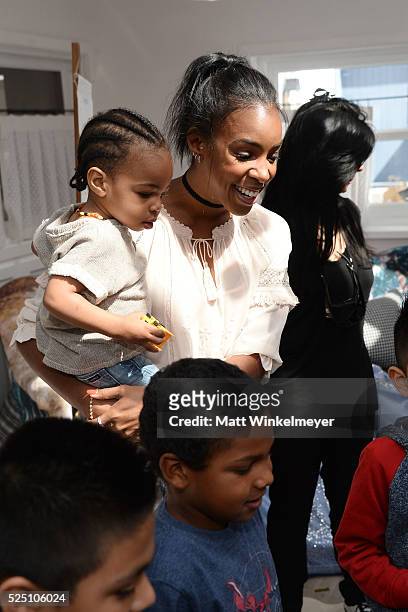 Singer Kelly Rowland attends the Baby2Baby Mother's Day Party presented by Tiny Prints at AU FUDGE on April 27, 2016 in West Hollywood, California.