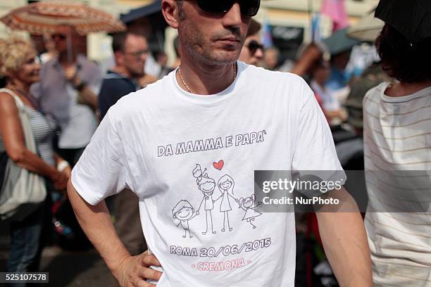Man is portrayed while wearing a shirt defending the traditional family during a mass demonstration in St.John Square in Rome on June 20, 2015....