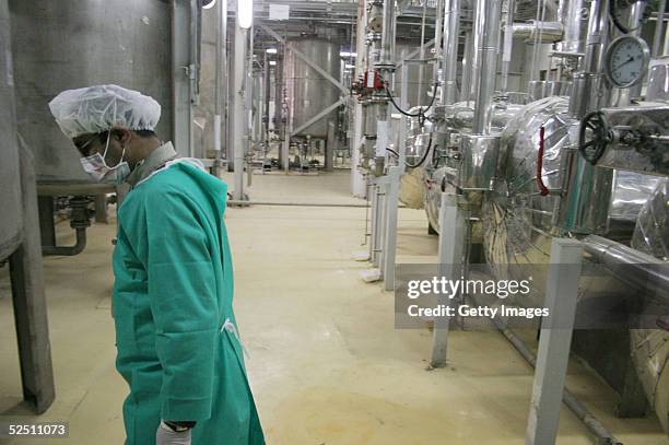 Worker walks inside of an uranium conversion facility March 30, 2005 just outside the city of Isfahan, about 254 miles , south of capital Tehran,...