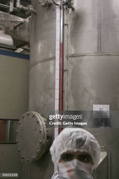 Worker stands inside of an uranium conversion facility March 30, 2005 just outside the city of Isfahan, about 254 miles , south of capital Tehran,...